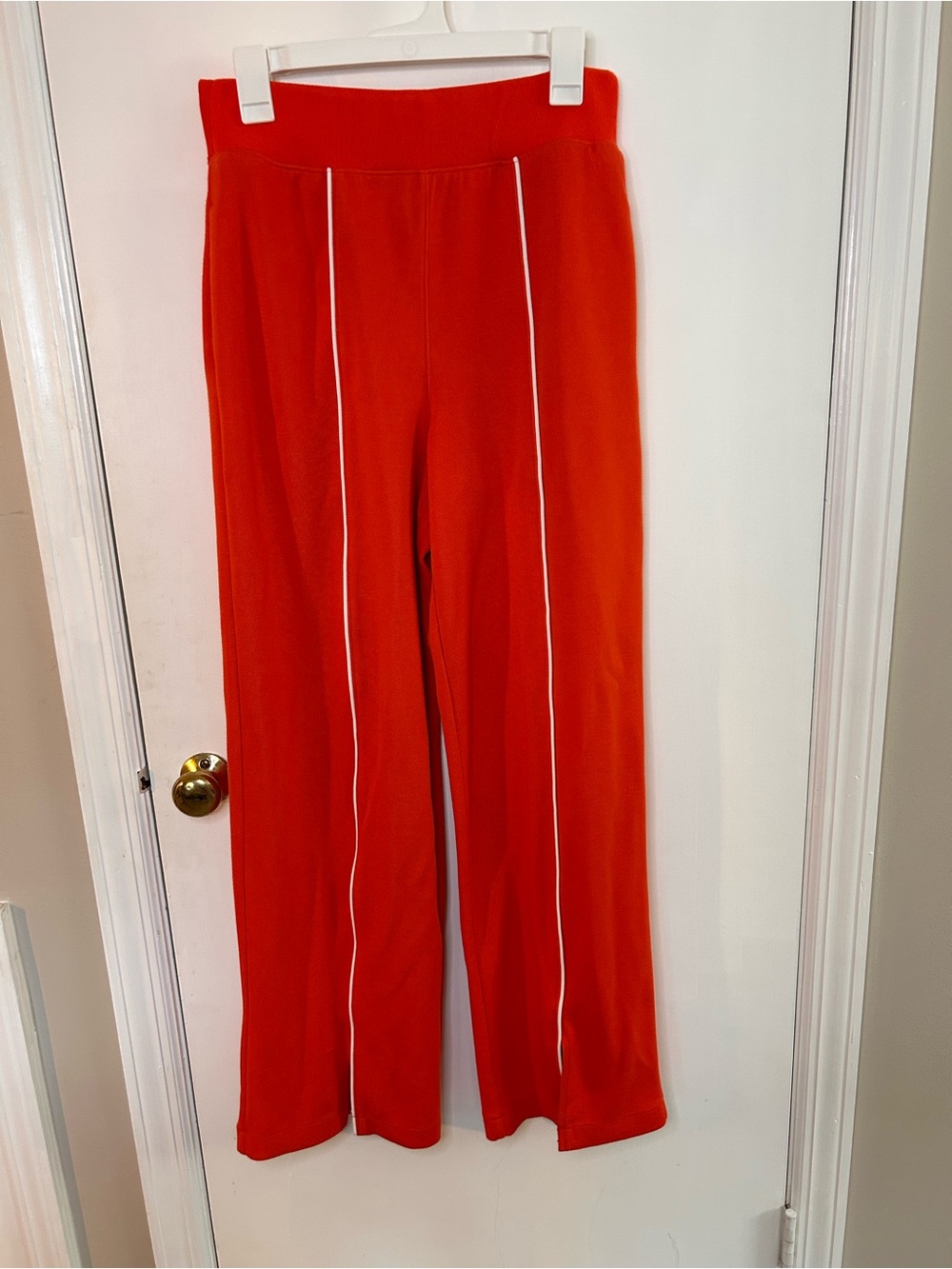 SPANX RED PULL ON PANTS WITH WHITE PIPING DOWN THE FRONT SIZE MEDIUM